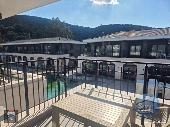 KUŞADASI KUŞTUR’DA ÖZTAŞ COUNTRY’DE 2+1 DAİRE HAVUZLU SİTEDE DENİZE YÜRÜME MESAF