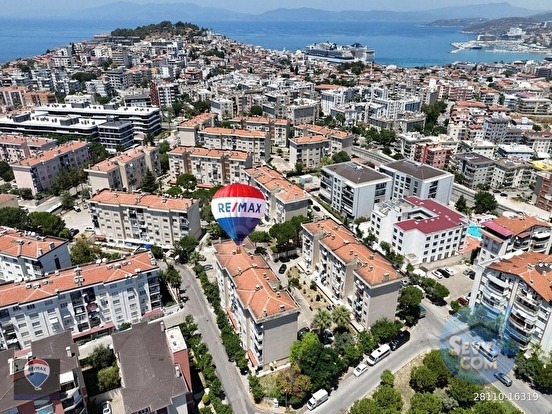 KUŞADASI ALTINGÜVERCiN SiTESiNDE SATILIK FERAH 2+1 DAiRE